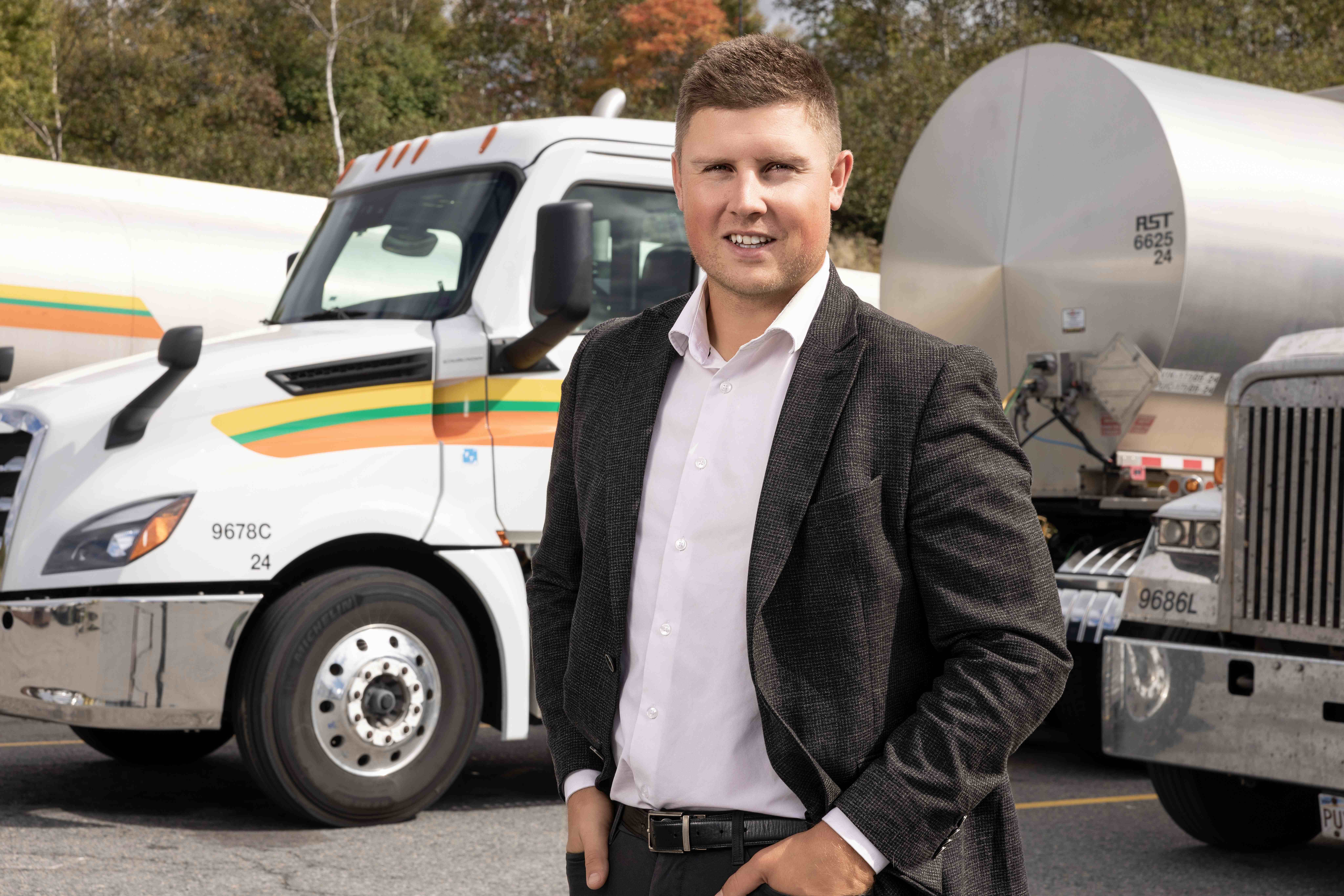 RST Employee Standing in front of RST truck